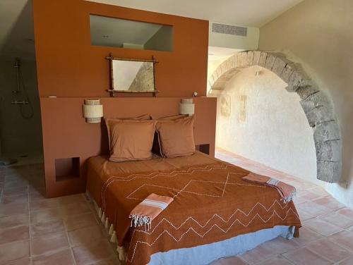 Ένα ή περισσότερα κρεβάτια σε δωμάτιο στο La Planette