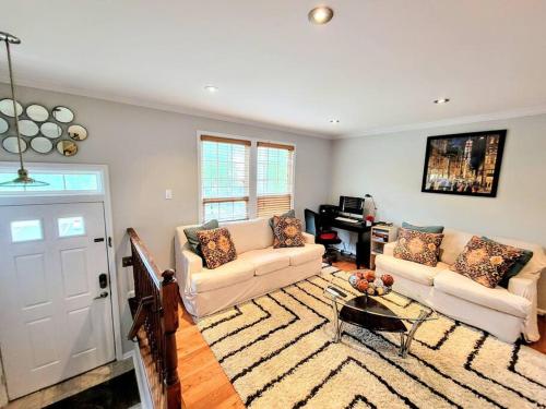 a living room with two couches and a piano at Awesome Home in suburb Washington DC near Airport with WiFi and Parking in Herndon
