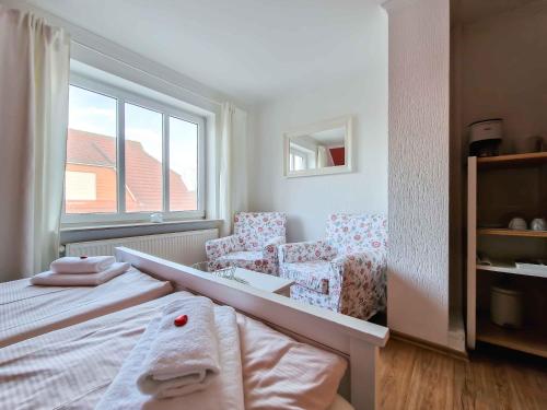 Postel nebo postele na pokoji v ubytování Gästehaus Funk