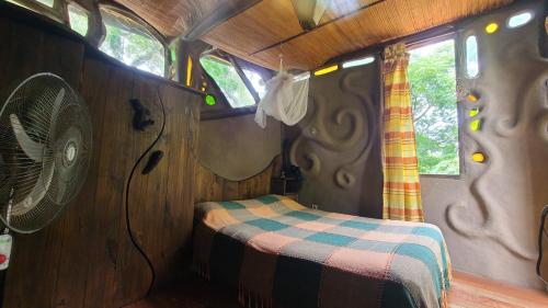 an inside view of a room in a train car at Casita de Duendes in Salinas