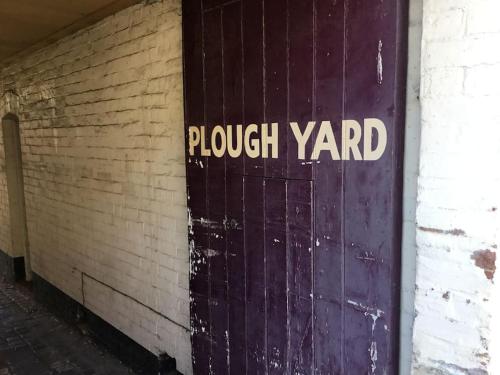 a purple door with the words rough yard on it at Beautiful mews cottage. Ledbury town centre. in Ledbury