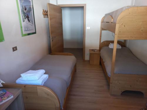 Ένα ή περισσότερα κρεβάτια σε δωμάτιο στο Chalet Relax