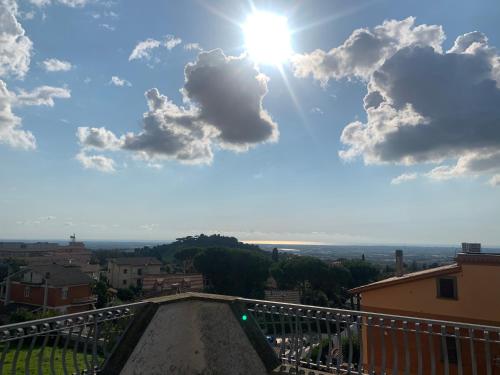 a view of the sky from a balcony with the sun at Villa Massimo in Albano Laziale