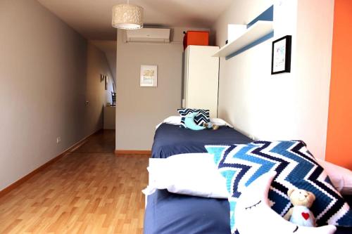 Ένα ή περισσότερα κρεβάτια σε δωμάτιο στο Precioso duplex en arbucias
