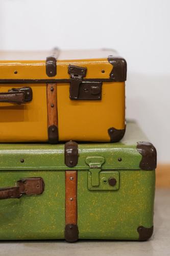 two suitcases stacked on top of each other at Atelier Recreation Village in Râşnov