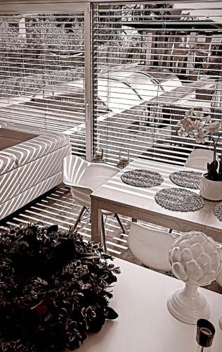 a room with a table with a potted plant on it at Vila Martina in Popůvky