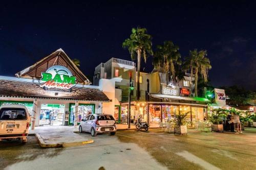 a parking lot in front of a store at night at Ocean Views & Private Beach! Luxury 4BDR Getaway in Punta Cana
