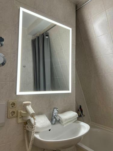 Um banheiro em Hotel Prinz