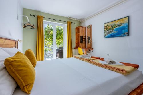 Posteľ alebo postele v izbe v ubytovaní Apartments Opacak Selce