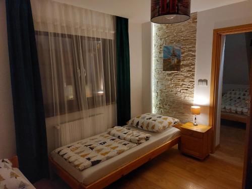 Postel nebo postele na pokoji v ubytování Noclegi nad potokiem