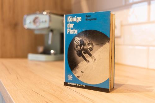 a book sitting on top of a table at s'Manggei Gosau in Gosau