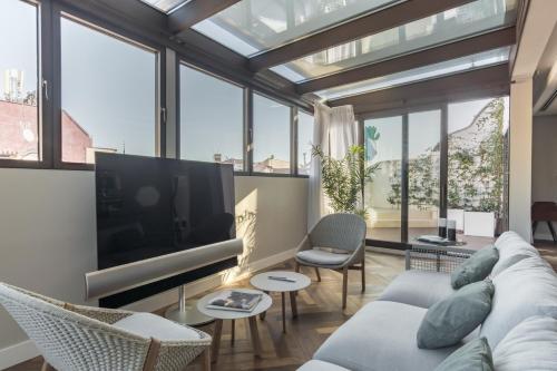 Uma TV ou centro de entretenimento em Madrid 1915 - Luxury Penthouse