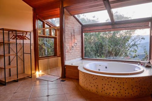 Ein Badezimmer in der Unterkunft Pousada Teto do Cafundó