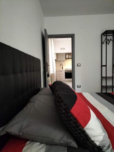 Letto o letti in una camera di Queen apartment al Palazzetto