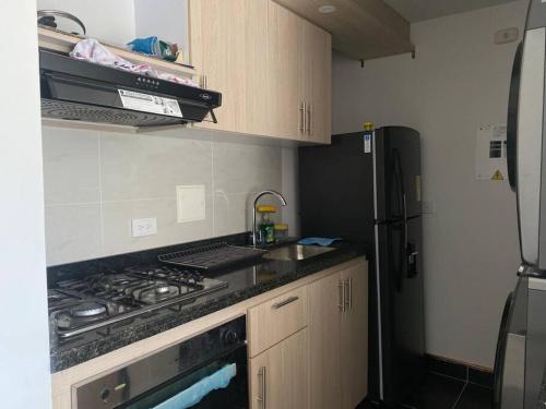 Kuhinja ili čajna kuhinja u objektu Espectacular apartamento en Bogota Suba