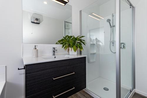 a bathroom with a sink and a shower at Just like home - Methven in Methven