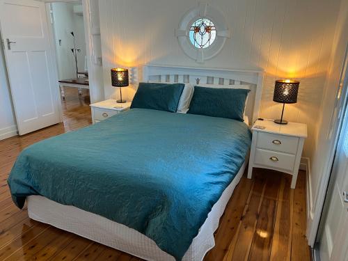 Ένα ή περισσότερα κρεβάτια σε δωμάτιο στο Old Queensland Charm Entire upper level