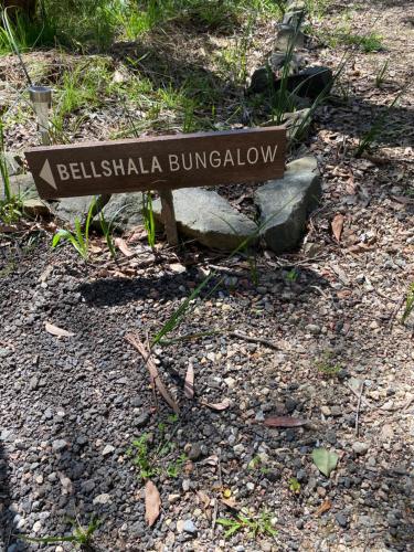 a sign that says bellahla bulevard on a rock at Bellshala bungalow in Bellbrae