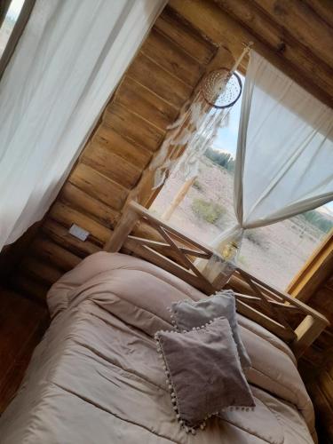 Χώρος καθιστικού στο Paramitas Cabañas de montaña