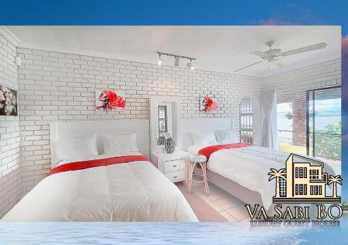 a white bedroom with two beds and a window at Va sabi bo, luxury family living in Hartbeespoort Dam in Hartbeespoort