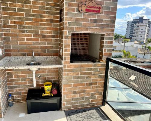 Fotografie z fotogalerie ubytování Apto novo com AC 1 quadra da praia Guaratuba PR v destinaci Guaratuba