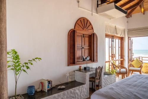 Gallery image of Sānti Beach House with pool & beach in Weligama