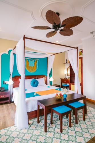 Posezení v ubytování De'Colore Villa Hoi An