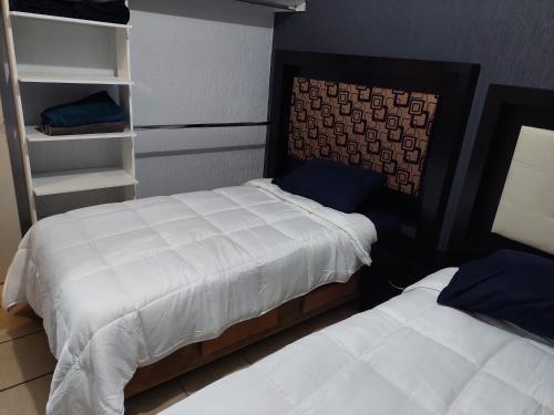 Ένα ή περισσότερα κρεβάτια σε δωμάτιο στο Casa Camichines