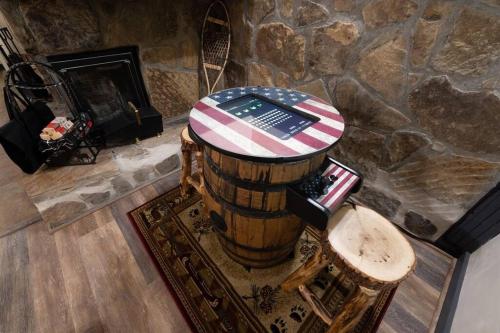 an overhead view of a room with a barrel and a fireplace at Misty Mountain Hop - Cobbly Nob Cabin with HotTub, Fast Wi-Fi, Privacy, Pool in Gatlinburg