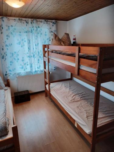 a bedroom with two bunk beds in a room at Seidis Apartment mit Küche 