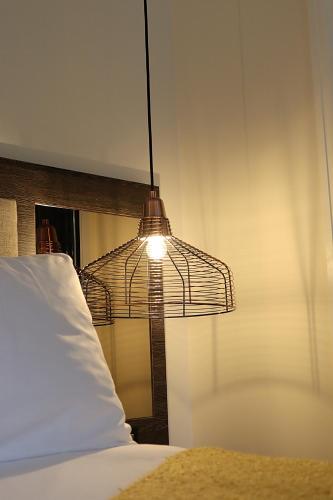 Una cama o camas en una habitación de José Pizarro The Swan Inn