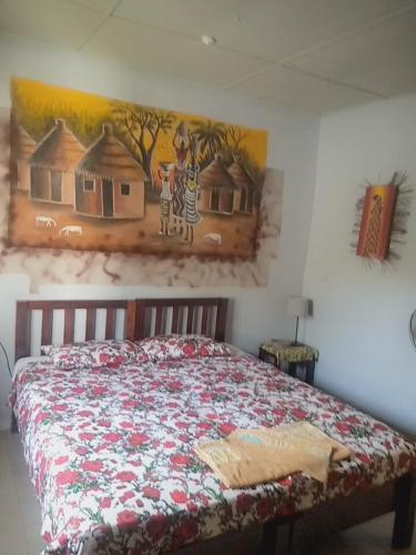 Кровать или кровати в номере Casa Hotel Sinkiling Gambia