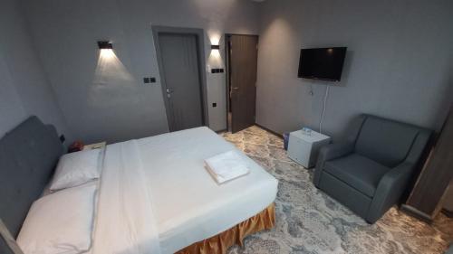 Cama o camas de una habitación en Sur Hotel