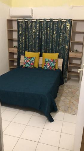 Llit o llits en una habitació de Blue Cocoon