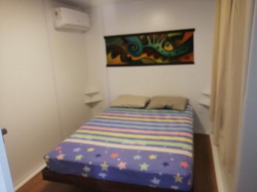 Giường trong phòng chung tại TRANQUILO JUAN
