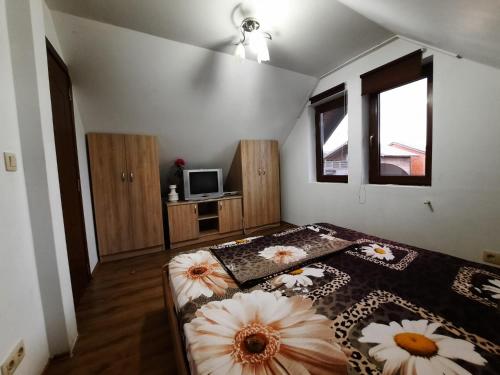 Кровать или кровати в номере Cabana Dor