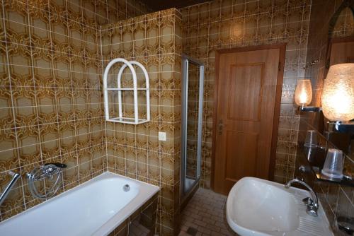 Ванна кімната в Haus Alpina by Châtel Reizen