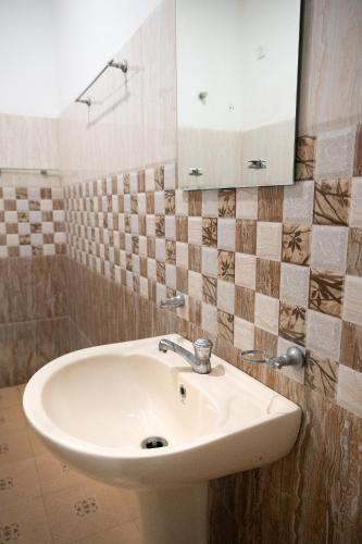 Ένα μπάνιο στο Villa Sunimal