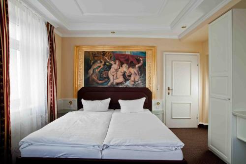 Postel nebo postele na pokoji v ubytování Pension Giesserstrasse Leipzig