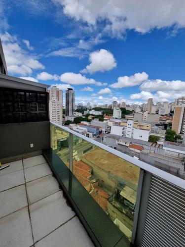 a balcony with a view of a city at 360 Perdizes in Sao Paulo