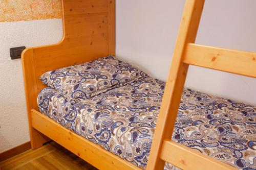 a couple of bunk beds in a room at Hotel Biancospino in Lanzada