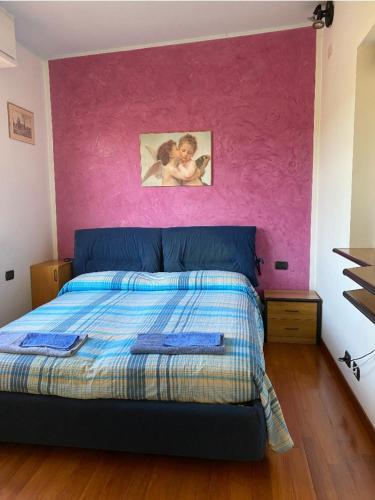 Postel nebo postele na pokoji v ubytování Casa tranquilla firenze