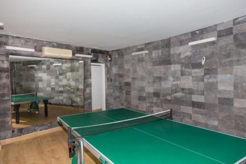 a ping pong room with a ping pong table at Albamar Duplex Apartment Javea Arenal by Rock Rentals in Jávea