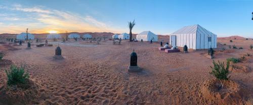 a model of a desert with buildings in the desert at Khadija Desert Camp in Merzouga