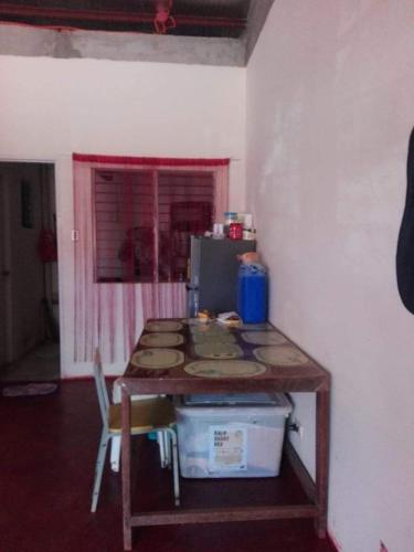 a table in the corner of a room at Weng in Tacloban