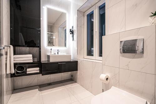 Koupelna v ubytování Calma Luxury Rooms