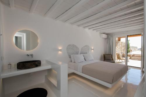 Ένα ή περισσότερα κρεβάτια σε δωμάτιο στο Villa Costa by Whitelist Mykonos