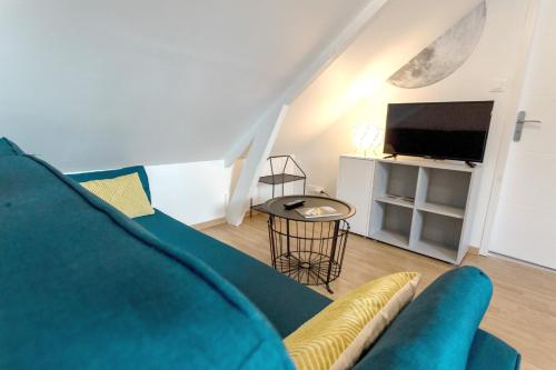 Μια τηλεόραση ή/και κέντρο ψυχαγωγίας στο Appartement Luna Hypercentre Gare à 300m