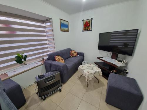 TV a/nebo společenská místnost v ubytování Casa Frutillar Alto