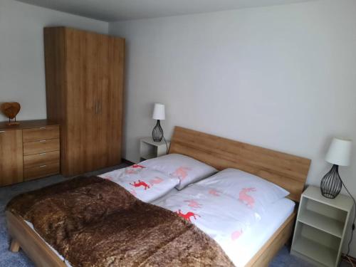 Кровать или кровати в номере Haus Florian